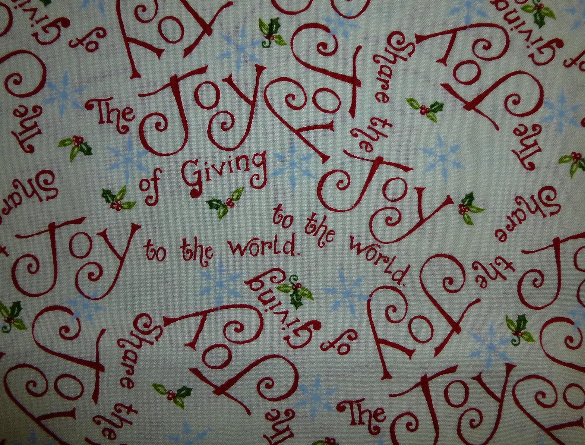 Weihnachtsstoff "Share the Joy" Schrift von Moda