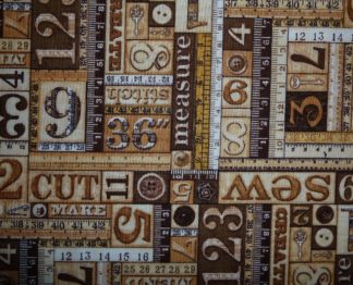 Stoff mit Maßbändern beige-braun