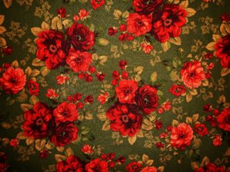 Stoff Rosen rot auf grün