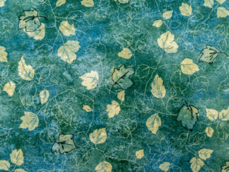 Stoff Blätter auf blau-petrol